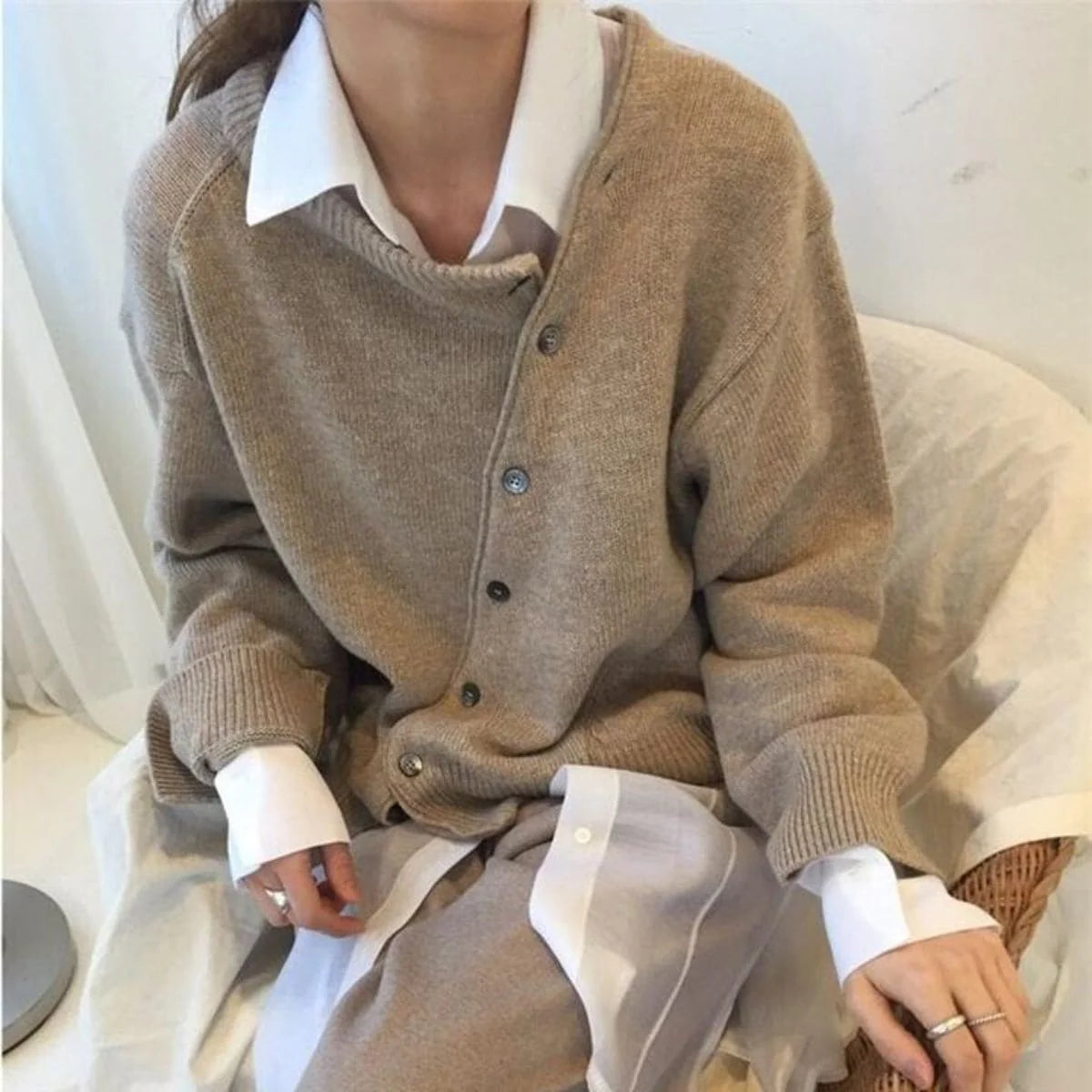 Luna asymmetric button cardigan worn relaxed