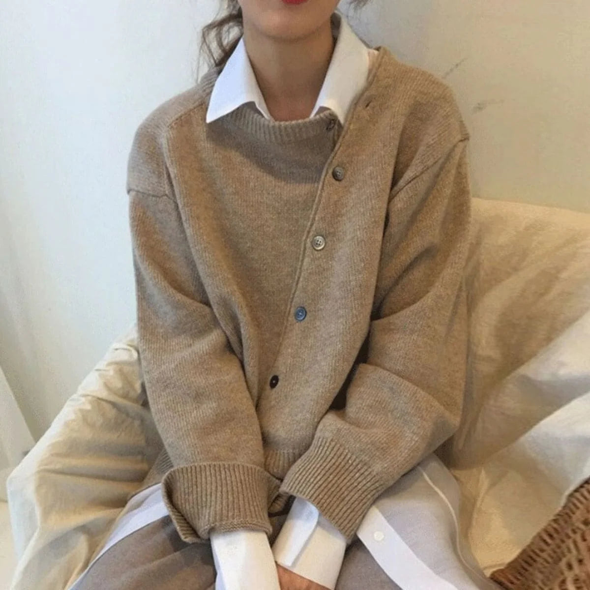 Luna asymmetric button cardigan worn relaxed