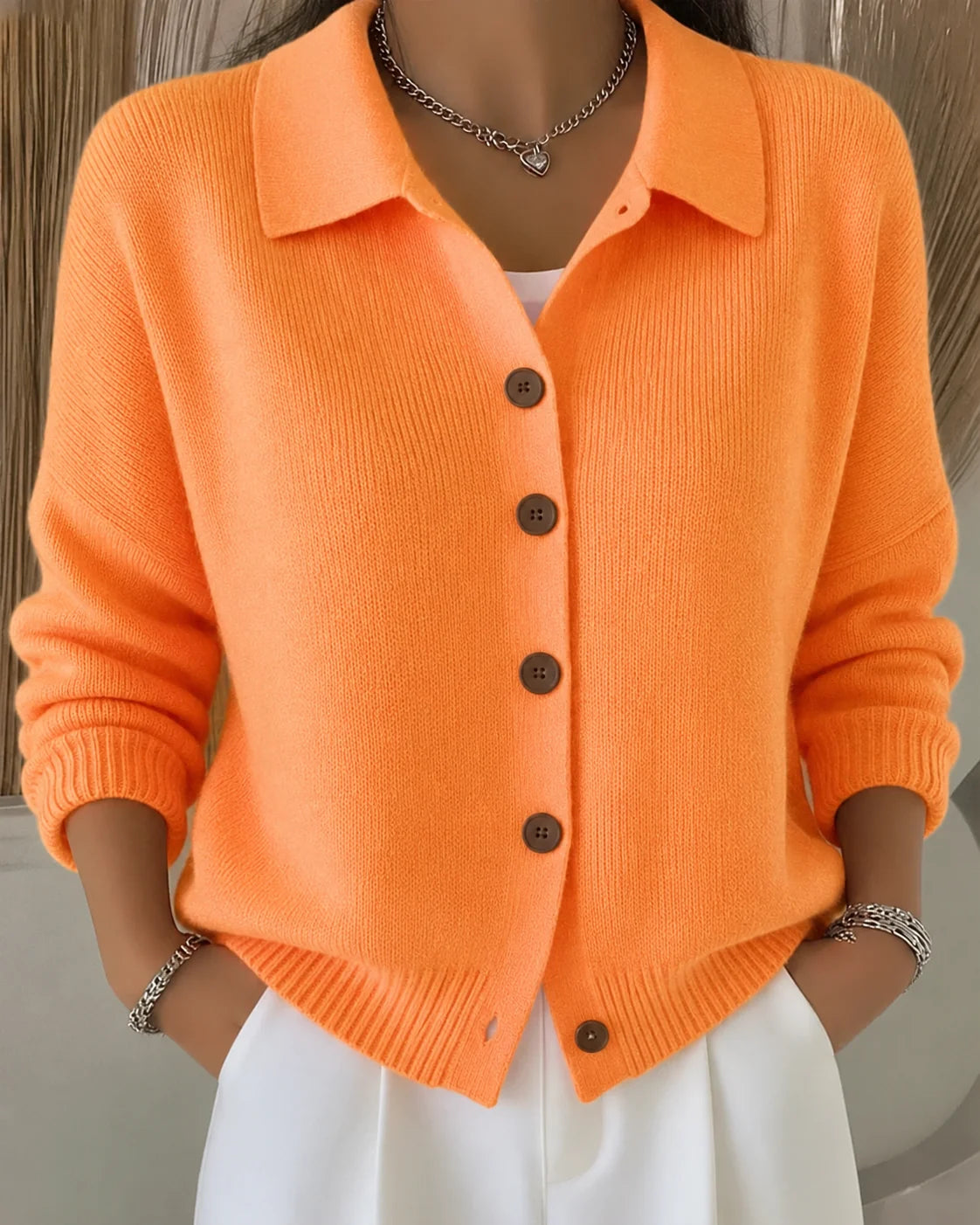 Agnes collared knit cardigan worn over a top