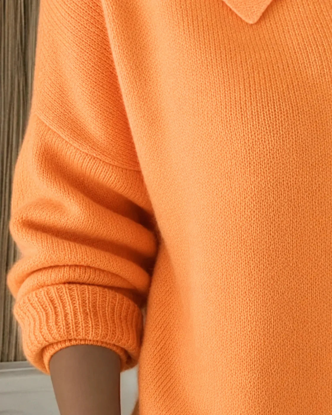 Agnes collared knit cardigan worn over a top